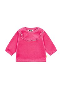 Blusa larga de terciopelo rosa de manga larga con un escote con volantes y puños elásticos. El diseño tiene un color sólido y simple sin patrones.