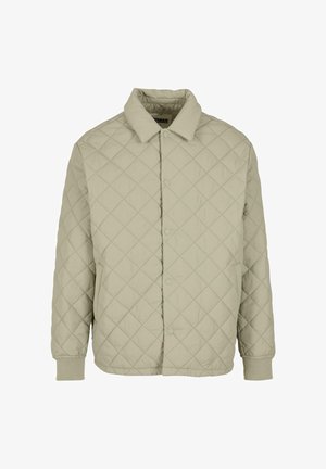 Jachetă matlasată, de culoare verde deschis, cu închidere prin butoni, guler și manșete ribbate. Materialul are o textură fină cu un model în diamant.