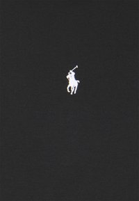 Polo shirt in cotone nero con logo ricamato di un cavallo e cavaliere bianco sul lato sinistro del petto. Tessuto morbido e design classico.