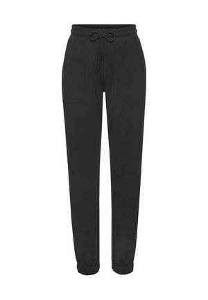 Black jogger pants made of soft material, featuring an elastic waistband with drawstring, side pockets, and tapered cuffs.