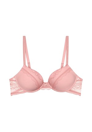Lichtroze beugelbh met kanten rand, verstelbare dunne bandjes en gevormde cups op een witte achtergrond.
