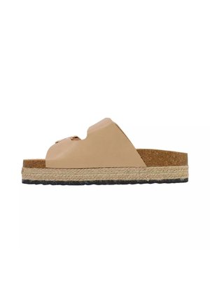 Sandalo beige aperto con plantare in sughero, due fibbie frontali, intersuola in corda intrecciata e suola esterna in gomma nera testurizzata.
