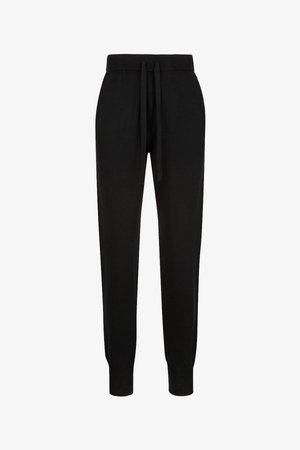 Schwarze, gestrickte Jogginghosen mit elastischem Bund, Kordelzug, Bündchen an den Knöcheln und glatter Textur. Einfaches Design ohne Muster oder Verzierungen.