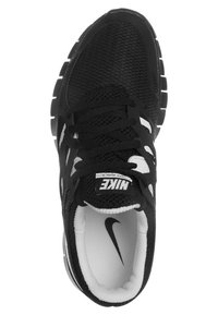 Chaussure de course Nike noire avec doublure intérieure blanche, tige en mesh et lacets noirs, vue de dessus.
