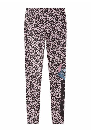 Lyserøde leggings med sort blomster- og leopardprint, der viser en tegneserieblå figur, som kigger frem fra nederste højre ben.