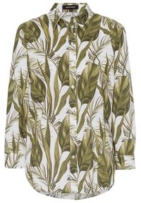 Chemise à manches longues avec un motif de feuilles vertes sur fond blanc, avec un devant à boutons et un ourlet arrondi pour un ajustement décontracté.