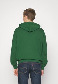 Lacoste SUBTLE LOGO UNISEX - Felpa con cappuccio - green