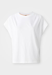 T-shirt bianco a maniche corte con vestibilità ampia. Presenta un colletto rotondo e un discreto logo sul davanti. Realizzato in tessuto di cotone.