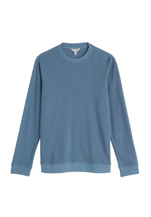 Vaaleansininen pitkähihainen collegepaita, jossa on pyöreä pääntie ja kuvioitu resorikangas. Resorit hihansuissa ja helmassa ovat sileää, samaan sävyyn sopivaa sinistä kangasta.