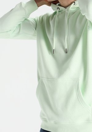 Licht mintgroene hoodie van zachte stof, met een kangoeroezak, trekkoorden en geribbelde manchetten. Vlotte textuur met subtiele stikdetails.
