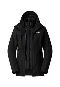 Giacca North Face nera a due strati con cappuccio in tessuto esterno e fodera interna trapuntata con zip, visibile su uno sfondo bianco.