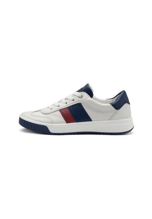 White low-top sneaker with navy and red side stripes, navy heel and tongue accents, white laces, and navy rubber sole.