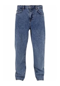 Light blue denim jeans with a relaxed fit, five pockets, and contrasts stitching. The waistband includes belt loops and a logo patch.