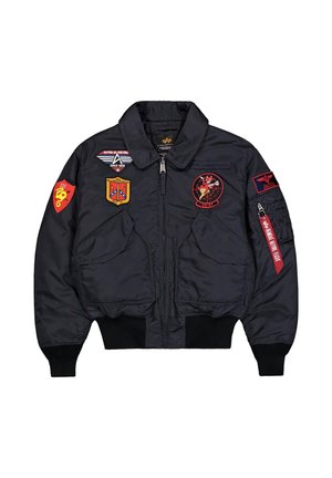 Schwarze Bomberjacke mit mehreren bunten bestickten Patches auf Brust und Ärmeln, Frontreißverschluss und zwei Frontklappentaschen.