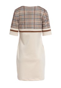 Kremowa sukienka z górną częścią w kraciasty wzór w odcieniach brązu, niebieskiego i kremowego. Posiada krótkie rękawy i dwie kieszonki po bokach.