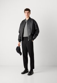 Calvin Klein PULL ON - Trousers - black