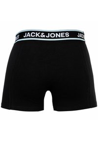 Svarta bomullskalsonger med en bred svart midjeband som har en vit "JACK&JONES"-logotyp och ljusblå detaljer. Slät textur, figurnära design.