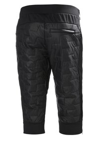 Czarne sportowe spodnie pikowane z miękkim paskiem w talii, zamykaną kieszenią na zamek i elastycznymi mankietami. Materiał ma gładką, błyszczącą teksturę.