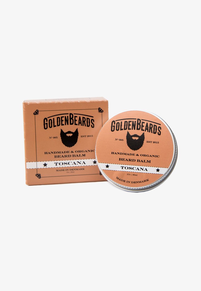 Bartbalsam in einer silbernen Dose mit einem pfirsichfarbenen Etikett. Die Verpackung zeigt schwarze Schrift auf einem passenden Hintergrund. Beide sind mit "Toscana" beschriftet.