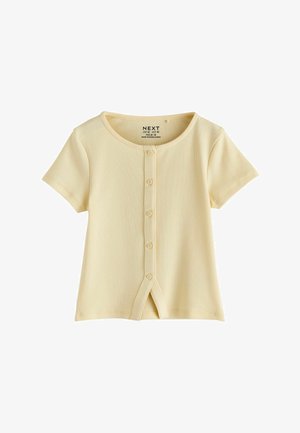 Svetložltý rebrovaný top s krátkym rukávom, prednými gombíkmi a malým predným rozparkom na leme.