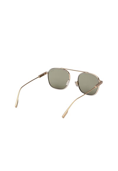 Slim gold metal frame sunglasses with green tinted, slightly rounded square lenses and adjustable nose pads.