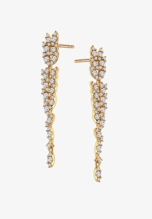 Złote kolczyki z kaskadowym wzorem, ozdobione przezroczystymi kamieniami szlachetnymi, przedstawiające liściasty motyw i wypolerowane wykończenie.