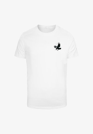 White cotton t-shirt featuring a black graphic of a bird with outstretched wings on the left chest area. Short sleeves, round neck.