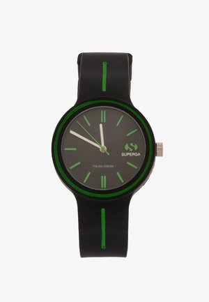 Black silicone watch with green accents, round face, simple hour markers, and silver knob. Features "Italian Design" text.