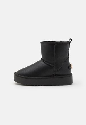 TESSAH - Platform ankle boots - black