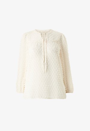 Cremefarvet bluse med en tekstureret, gitterlignende mønster, lange ærmer med elastiske manchetter og en nøglehuludskæring med snore.