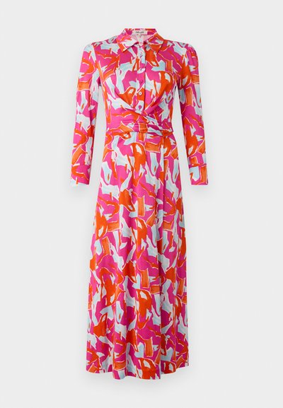 Long-sleeved dress made of fabric featuring a bold abstract pattern in pink, red, and light blue, with a button-down collar and waist twist detail.
