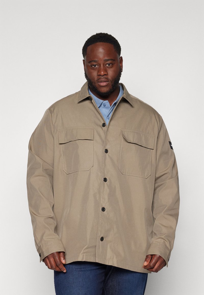 Calvin Klein Könnyű dzseki - brindle