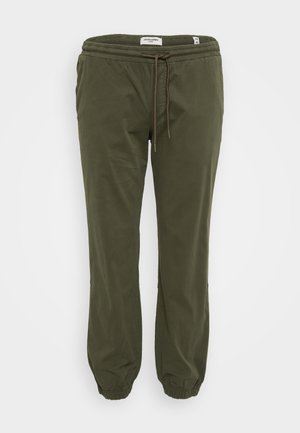 Olive green jogger pants made from soft fabric. Features an elastic waistband with adjustable drawstring and tapered cuffs.