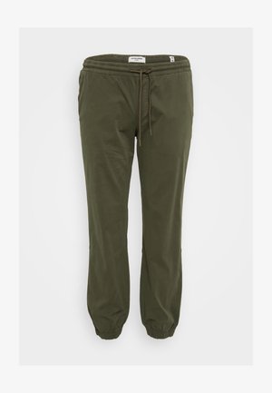 Olive green jogger pants made from soft fabric. Features an elastic waistband with adjustable drawstring and tapered cuffs.