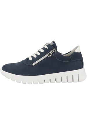 Navy suede sneaker with white laces and a side zipper. Features a thick white rubber sole with a wavy texture. Minimalist design.