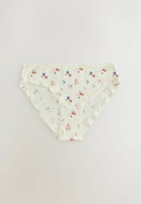 Kremowa bielizna damska z małymi nadrukami kwiatowymi i kuchennymi przyborami, wykończona delikatną koronką na krawędziach.