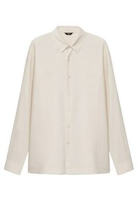 Chemise beige à manches longues avec col pointu, boutons sur le devant et manches à revers, présentée sur un fond blanc.