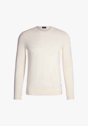 Cream-colored knit sweater with long sleeves, round neckline, and ribbed cuffs. Smooth texture, minimal branding at the hem.
