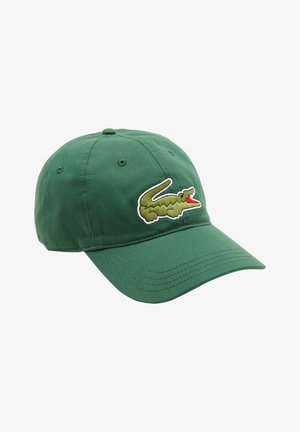 Casquette de baseball en coton vert avec une visière courbée, présentant un logo de crocodile vert avec une bouche rouge brodé sur le devant.