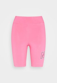 Rosa cykelbyxor i en mjuk, stretchig tyg. Har en hög midja och en kontrasterande bokstav "N" grafik på vänster ben.