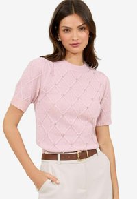Light pink knitted short-sleeve sweater featuring a diamond pattern with embellishments. It has a round neckline and ribbed cuffs.