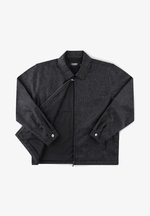 Veste zippée gris foncé avec col, manches longues, poignets boutonnés et doublure intérieure lisse partiellement dézippée pour montrer l'intérieur.