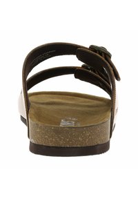 Sandalo in pelle marrone con due fascette regolabili, una soletta imbottita e una suola testurizzata di un marrone chiaro.