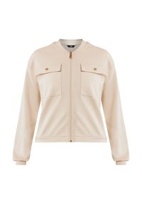 Beige mikina na zip s dvěma náprsními kapsami, zlatými detaily, žebrovanými manžetami a kulatým výstřihem. Hladká textura a volný střih.