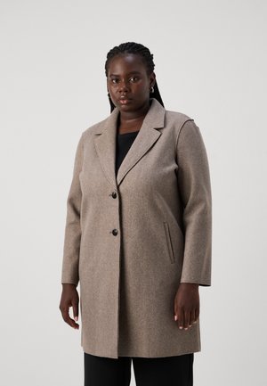 Manteau en mélange de laine brun clair avec un col en pointe, deux poches avant et une fermeture à un bouton. Manches longues, coupe ajustée.