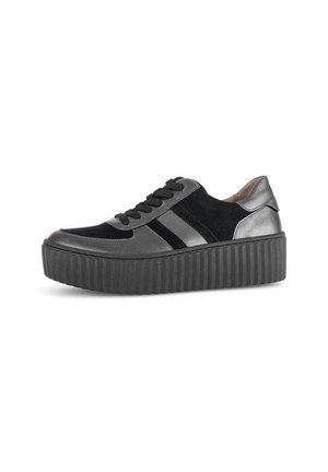 Black platform sneakers with suede and leather upper, featuring horizontal stripes and round laces. Ribbed sole and contrasting textures.