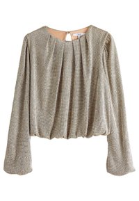 Blouse à manches longues en tissu métallisé doré, avec de douces plis, un col rond et un ourlet froncé. Détail d'ouverture en forme de clé au dos.