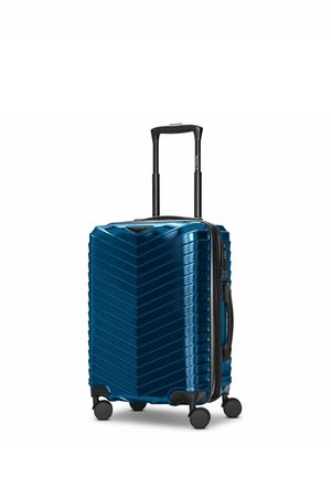 Blauer Hartschalenkoffer mit Chevron-Muster, schwarzem Teleskopgriff, Seitengriff und vier schwarzen Spinner-Rollen.