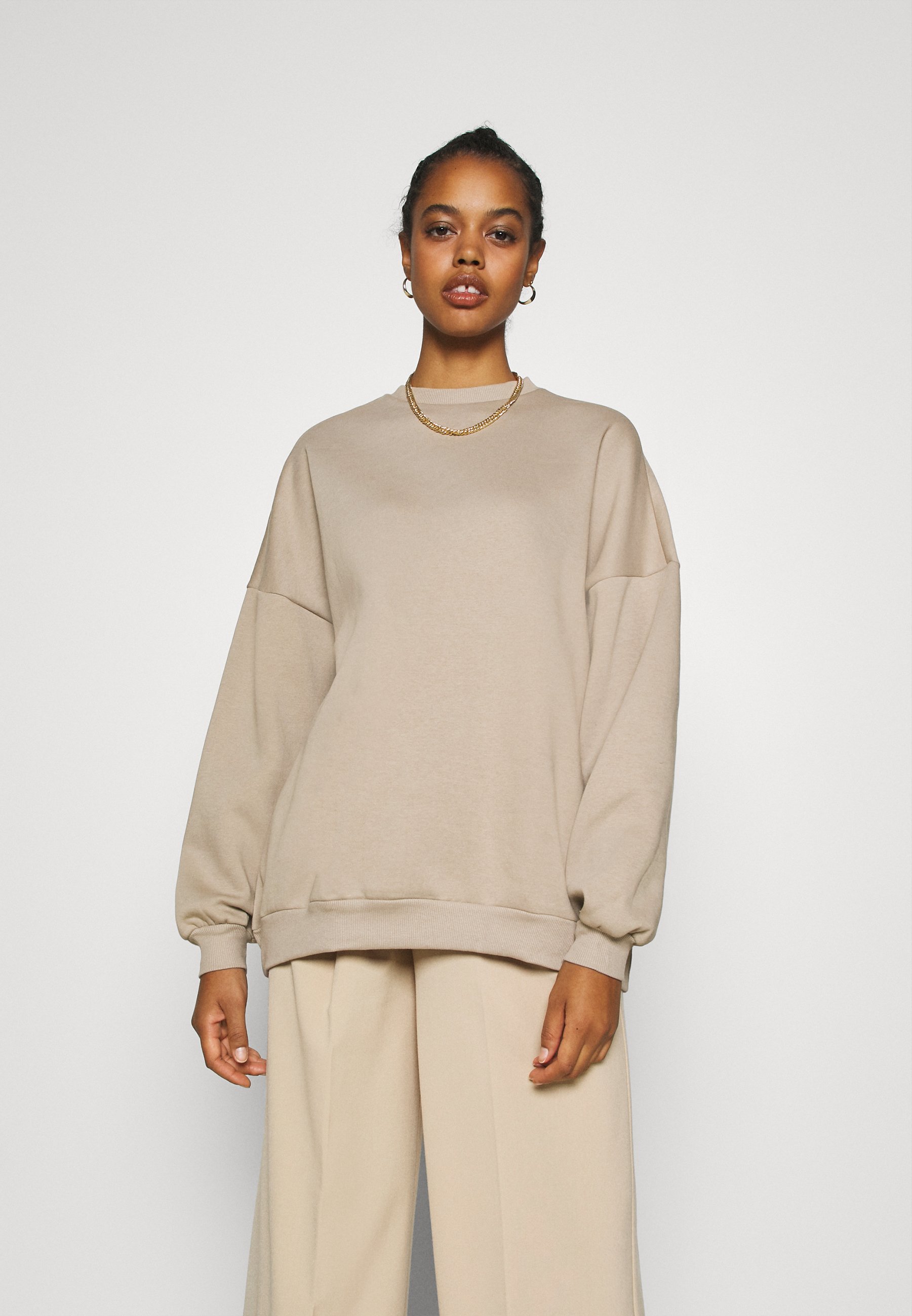 beige oversized sweatshirt