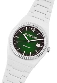 Montre en silicone blanche avec un cadran vert, des index horaires en acier inoxydable et un affichage de la date. Elle est dotée d'une lunette texturée et d'un bracelet à maillons en bloc.